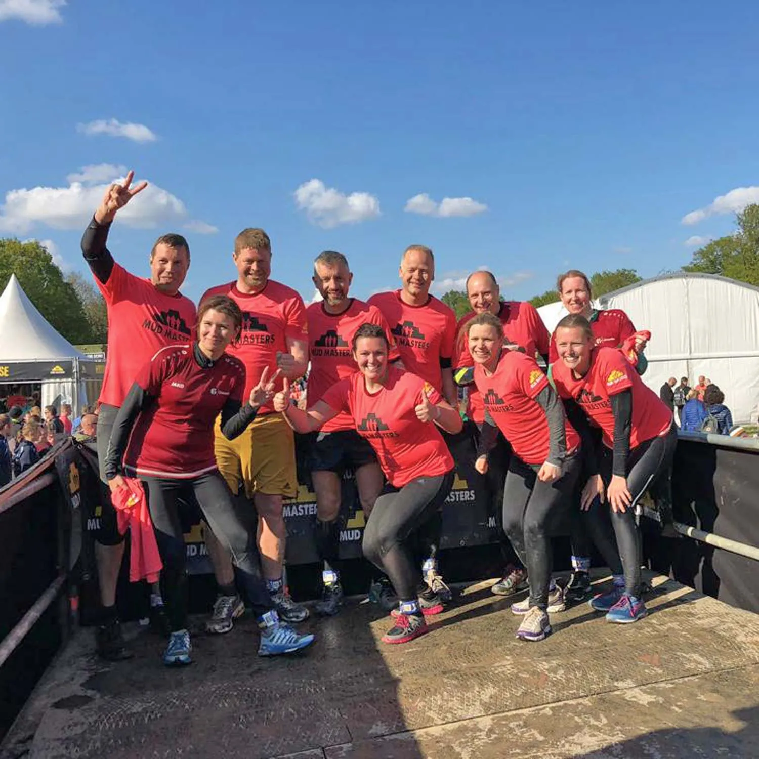 Teamfoto von Mitarbeitenden bei einem Laufevent